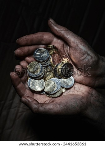 hand holding a euro cents coins