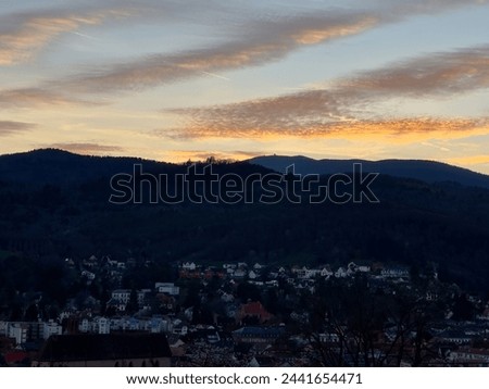 Sunset Silhouettes over Guebwiller with Grand Ballon Peak Looming in the Vosges Mountains