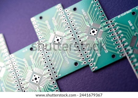 Green printed circuit boards for soldering radio components.  A set for a beginner amateur radio operator.