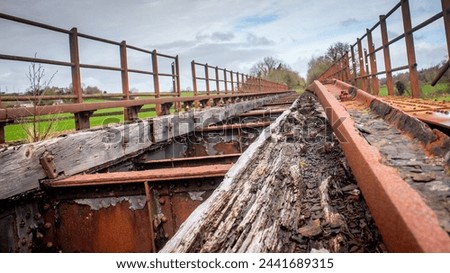 disused derelict railway bridge abandoned Royalty-Free Stock Photo #2441689315