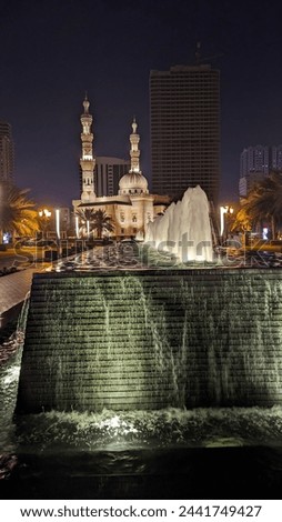 Pictures of a very beautiful water fountain with lights, a beautiful realistic night picture with lights