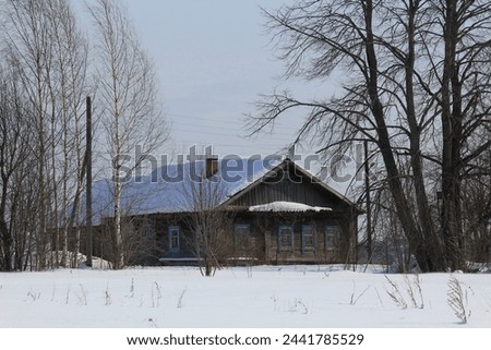 uninhabited abandoned houses in old villages from the times of collective farms and collectivization in the Soviet Union. 1930-1940-1950 of the last century, surrounded by forests and fields