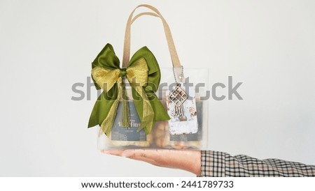 Celebrate the spirit of Ramadan with our exquisite Ramadan hamper, carefully curated to enhance your Iftar gatherings. This captivating image captures the essence of the holy month, showcasing abeauty Royalty-Free Stock Photo #2441789733
