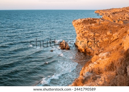Seascape. Blue sea and rocky coast of Crimea. Travel and tourism. Wallpaper.