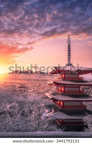 Fujiyoshida, Japan Beautiful view of mountain Fuji and Chureito pagoda at sunrise of Mount Fuji during winter.This is one of the famous spot to take pictures of Mount Fuji.