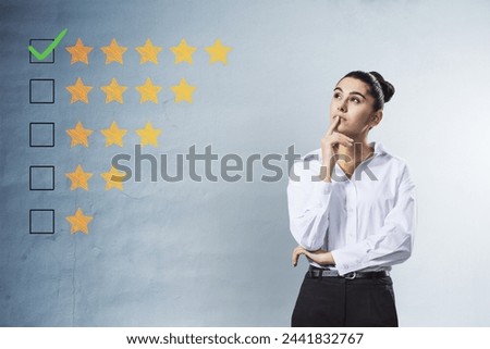 Thoughtful young woman with 5 star rating on concrete wall background. Customer service and excellent feedback