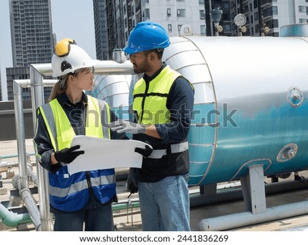 Plumber electronic person people human engineer talking speak discussion manager supervisor technician boss work professional contractor explain repair inspector project site headwear rooftop labour Royalty-Free Stock Photo #2441836269