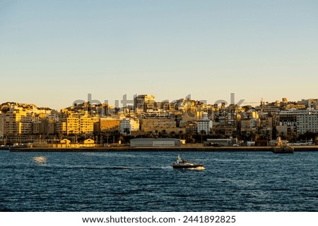 Amazing view of Spanish port of Ceuta by sunset, North Africa Royalty-Free Stock Photo #2441892825