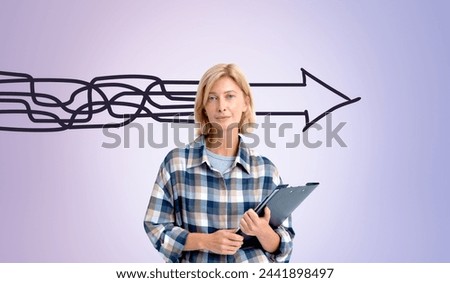 Beautiful smiling blond woman with clipboard in hands, doodle sketch of chaotic lines moving through head making a straight arrow. Concept of plan, strategy, thought and mindset