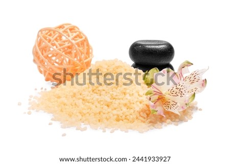 Orange sea salt, flower, spa stones and rattan ball isolated on white
