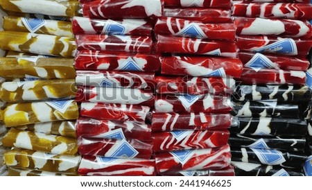 Colourful Dodol is a traditional snack from West Java, Indonesia. it taste sweet an chewy with various flavour such as chocolate,strawberry,durian and many. Flat lay picture