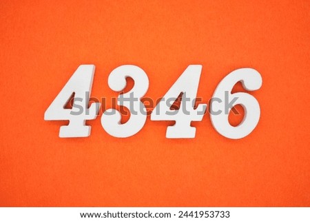 Orange felt is the background. The numbers 4346 are made from white painted wood.
