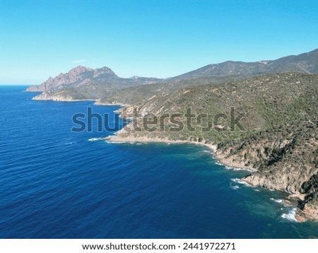 The Mediterranean Sea meets the lush, natural mountains of northern Corsica in France 