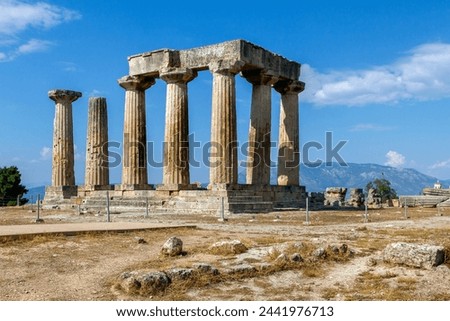 The archaic temple of Apollo, in ancient Corinth, Greece. It was built with monolithid doric columns, around 530 BC. Royalty-Free Stock Photo #2441976713