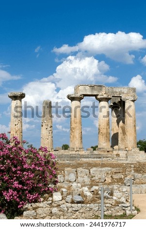 The archaic temple of Apollo, in ancient Corinth, Greece. It was built with monolithid doric columns, around 530 BC. Royalty-Free Stock Photo #2441976717