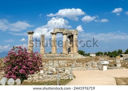 The archaic temple of Apollo, in ancient Corinth, Greece. It was built with monolithid doric columns, around 530 BC. Royalty-Free Stock Photo #2441976719