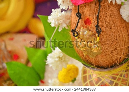 Wedding Pendant known as Thali or Tali worn with sacred thread by Tamil people. Royalty-Free Stock Photo #2441984389