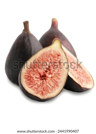 Fruit, fig is the edible fruit of Ficus carica, a species of small tree in the flowering plant family Moraceae. Figs can be eaten fresh or dried, processed into jam, rolls, biscuits and other desserts Royalty-Free Stock Photo #2441990407