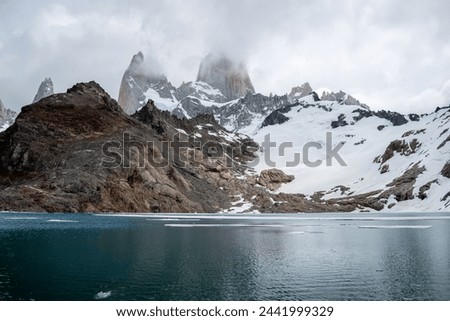 Beautiful image of Laguna de los Tres at the foot of Mount Fitz Roy. Beautiful postcard of Mount Fitz Roy. Cerro fitz Roy covered by clouds
