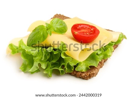 Tasty sandwich with cheese, tomato and lettuce on white background Royalty-Free Stock Photo #2442000319