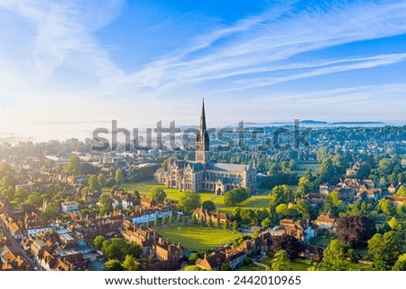 Aerial view over Salisbury and Salisbury Cathedral on a misty summer morning, Salisbury, Wiltshire, England, United Kingdom, Europe Royalty-Free Stock Photo #2442010965
