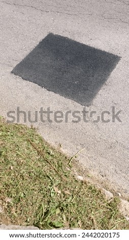 Asphalt patch in a road