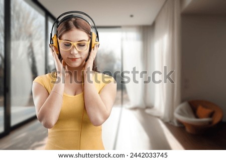 Young woman listen to music at home room