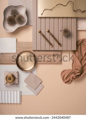 Stylish  flat lay composition in beige and gray color palette with textile and paint samples, panels and tiles. Architect and interior designer moodboard. Top view. Copy space.