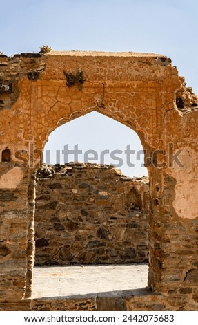 isolated ancient fort ruins with bright blue sky at morning image is taken at Kumbhal fort kumbhalgarh rajasthan india.