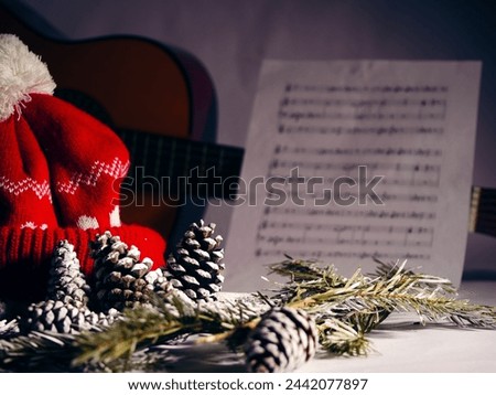 Christmas carols with pine cones and needles winter display medium shot selective focus