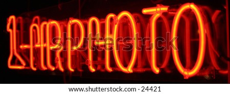 1 hour photo neon sign taken with a short time laps (bulb exposure) for effect
