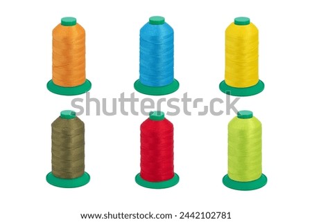 Spool thread collection. Various colors threads isolated. Thick machine thread plastic spool. Collection of cutout threads. Vibrant vivid colors. Sew threads. Colorful hobby background. Tailor shop. Royalty-Free Stock Photo #2442102781