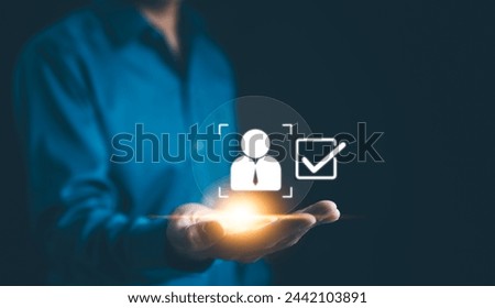 Interactive KYC compliance interface with the user. Businessman holding a digital screen interface for Know Your Customer (KYC) compliance and security with a virtual symbol. Identity verification, Royalty-Free Stock Photo #2442103891