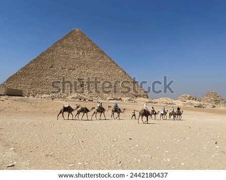 The Great Pyramid of Giza is the largest Egyptian pyramid and served as the tomb of pharaoh Khufu, who ruled during the Fourth Dynasty of the Old Kingdom.Cairo,egypt Royalty-Free Stock Photo #2442180437