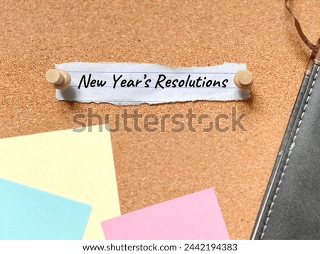 New year resolution concept with stationary background. Stock photo.