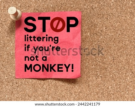 No littering sign on red paper background. Stock photo.