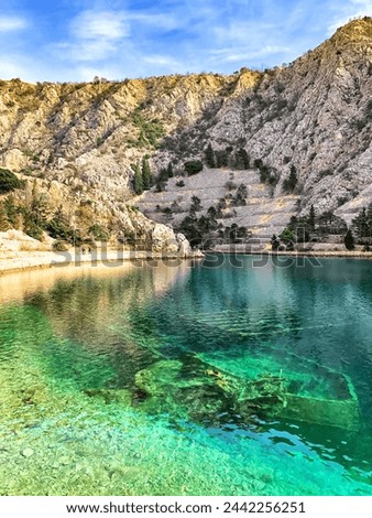 Uvala Zavratnica cove Croatia hrvatska turquoise sea clear water sunken ship clear sky sunny day hiking trail
 Royalty-Free Stock Photo #2442256251