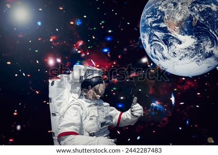 Astronauts and space on the backdrop. The elements of this image furnished by NASA.

