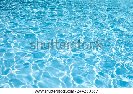 water swimming pool texture and surface water on pool, reflection blue wave nature water on the outdoor swimming pool
