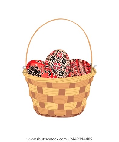 Easter eggs with Ukrainian ornament in basket.