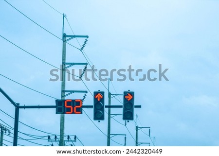 Background of traffic lights indicating stopping time, modern technology system For the safety of road users