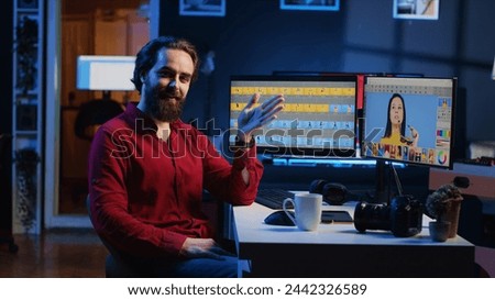 Photographer filming content for online streaming platform, discussing about software used to perform image editing. Photo editor recording video offering tips on making photographs adjustments