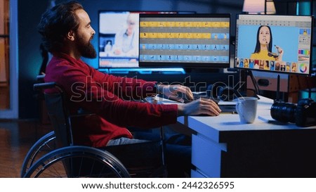 Photo editor in wheelchair working for independent production company, adjusting white balance on overexposed pictures. Paralyzed photographer with handicap in creative agency editing pictures