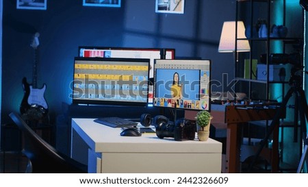 Photo editing software on computer screen in empty studio used for manipulating and enhancing digital images to improve quality. Photography organizing program displayed on PC monitors in media agency