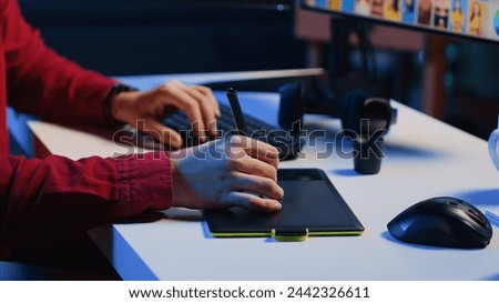 Photo editor using graphic tablet to edit lighting and color balance, delivering appealing photographs for magazines. Close up on graphic designer using stylus on touchscreen device to modify images