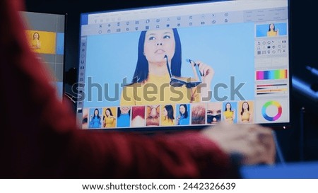 Photographer using professional photo editing tools, close up shot on PC display. Photo editor utilizing high tech photographs retouching application to make adjustments, zoom in on computer screen