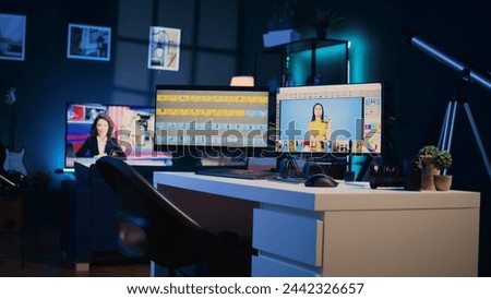 Cutting edge creative office in multimedia agency with multi monitor computer setup used for image retouching. Empty specialized post processing studio with editing software interface on PC screens