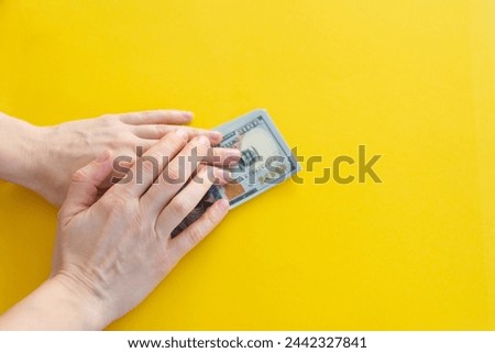 female hands counting banknotes money