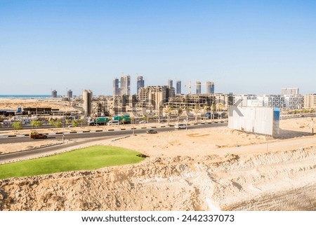 Editorial New Alamein Towers under construction Photo, shot is selective focus with shallow depth of field. Photo taken at North Coast Egypt on 11 July 2021