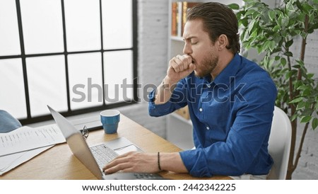 Young hispanic man business worker working coughing at the office